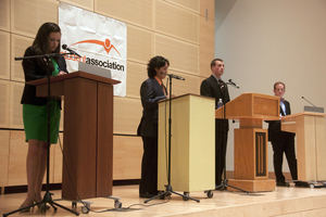 (From left) Allie Curtis, Iggy Nava, Kyle Coleman and PJ Alampi appear on stage in Joyce Hergenhan Auditorium for the Student Association presidential debate.