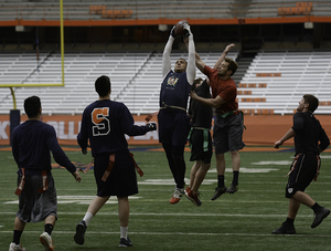 The teams White Lightning (red belts) and Justice League (green belts) played against each other in the final round of the flag football tournament held on Sunday. Justice League was the winner of this year’s annual tournament held by Otto's Army to raise money for cancer research.                  