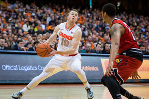 Trevor Cooney and the Orange face Louisville on Wednesday. Check out what our beat writers predic will happen when Syracuse faces the Cardinals