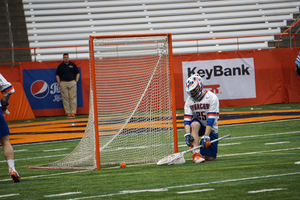 Dom Madonna and Syracuse gave up 14 goals to Rutgers, leading to a drop in the rankings.