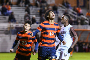 Tajon Buchanan (17) was named to first-team All-ACC and Ryan Raposo (23) made the All-Freshman team.