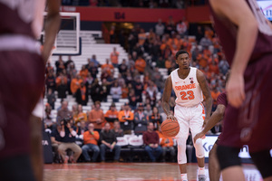 Frank Howard brings the ball up against Colgate.