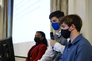 David Bruen (center) speaks at a Student Association meeting early in the semester.