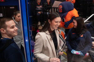 As an assistant coach, Megan Quinn has served as the bridge between the Paul Flanagan and Britni Smith eras of SU ice hockey.