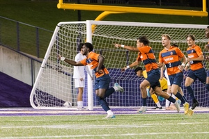 With Nicholas Kaloukian suspended, forwards Braedon  Smith (second left) and Michael Acquah (left) scored their first goals of the season to spearhead Syracuse's win over UAlbany.