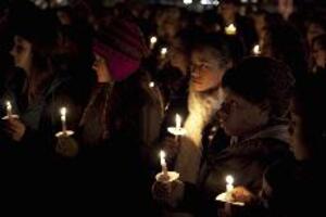 Students honor those who died in the Jan. 12 earthquake in Haiti during a candlelight vigil on the Quad in front of Hendricks Chapel Thursday night. The vigil was co-sponsored by student groups, including the Haitian American Student Association and the Phi Beta Sigma fraternity. They raised approximately $480 at the vigil to go towards relief efforts.