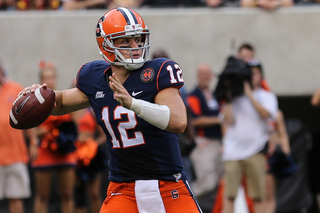 Syracuse Orange quarterback Ryan Nassib #12 looks to pass in the first half. 