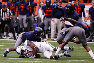 The Syracuse sideline watches on as its defense continued its strong afternoon. Duke came in having scored at least 30 points in all but one of its games. 