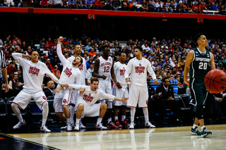 Oklahoma's bench celebrates as Oklahoma steadily takes the lead toward the end of first half. 