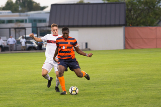 Junior defender Kamal Miller takes a kick with his strong left foot. 