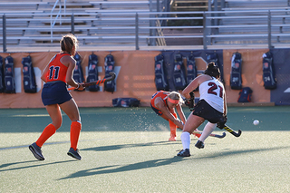 Junior Carolin Hoffmann passes the ball upwards to a teammate. 