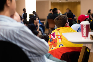 A fan cloaks themselves in the Spaniard flag while awaiting the turnout of their game against Japan. Many viewers carried their country’s flags and raised them in celebration when their team scored.