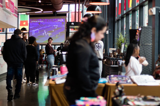 Salt City Market customers spend halftime browsing at Black Artist Collective’s 2nd annual Snowmies Holiday Market. The market showcased a multitude of Black- and Brown-owned small businesses in Syracuse.